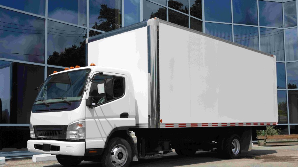 Furgoneta de reparto que necesita tarjeta MDL para transporte de mercancías